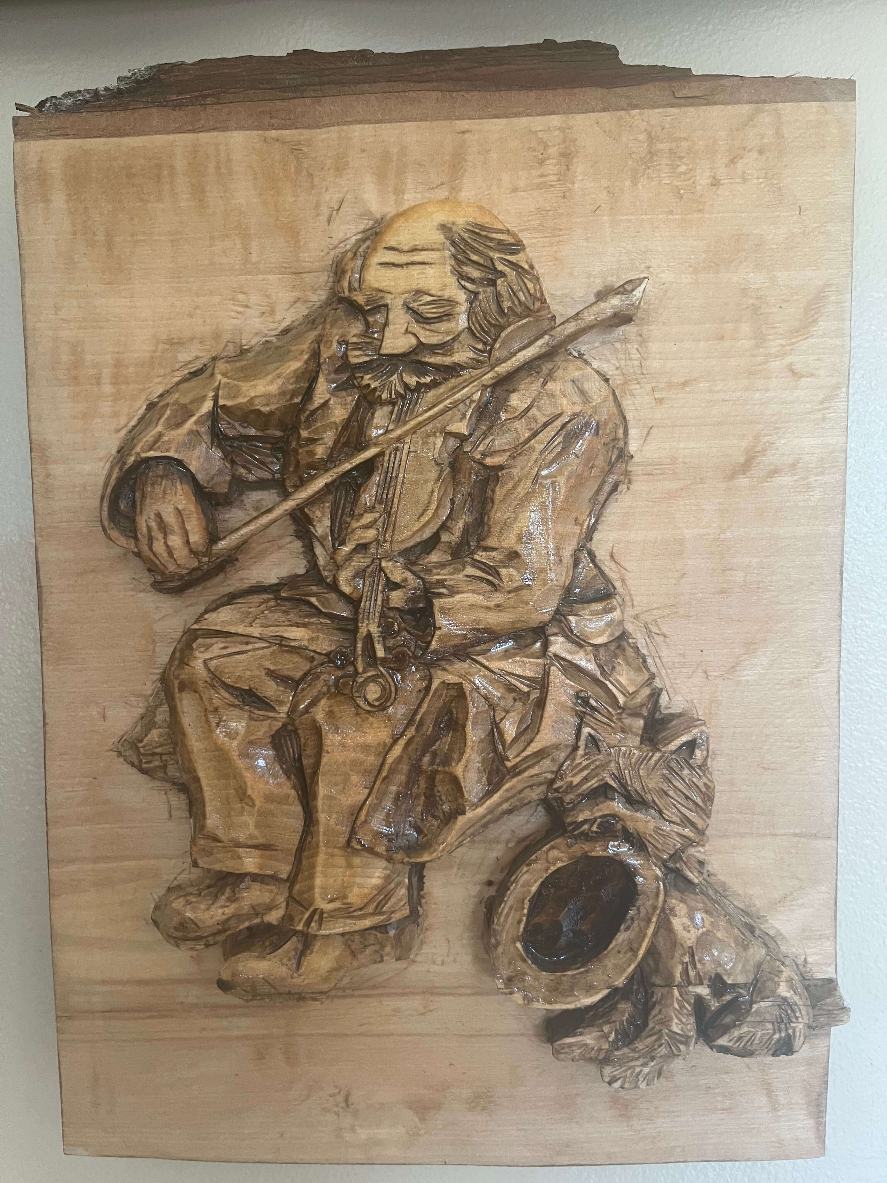 Man's Best Friend wood carving